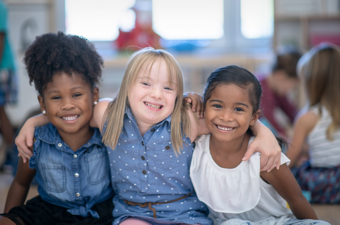 Group of children, one with down syndrome